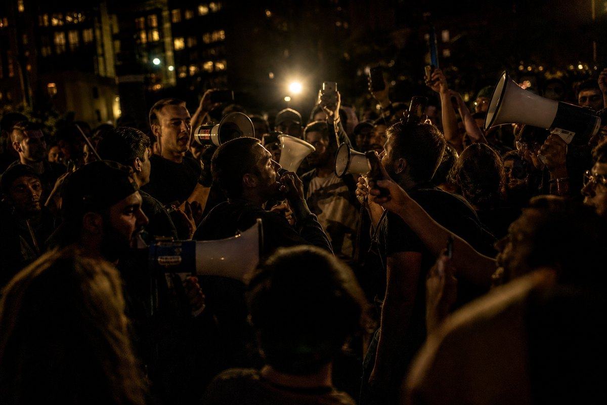 A crowd competing for attention in the night.